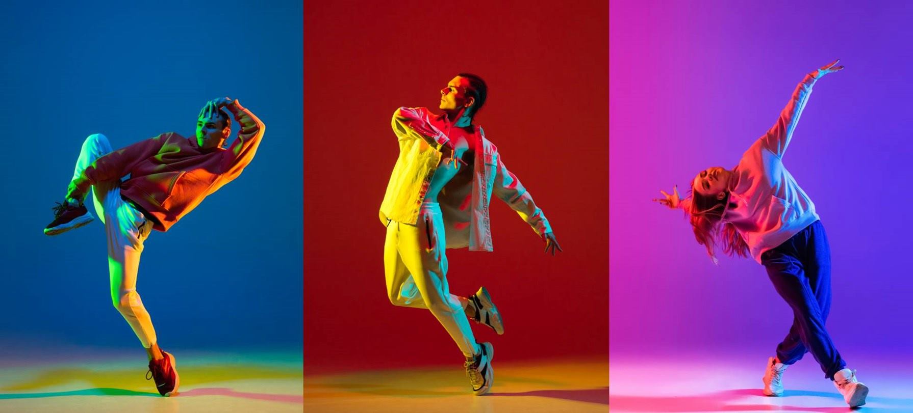 jovenes-bailando-sobre-fondo-multicolor